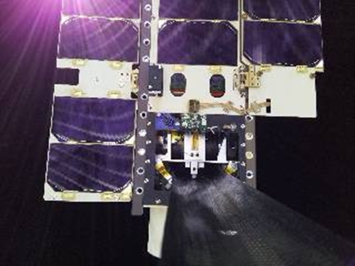 TPA-1 satellite from the deployed camera showing the Rolatube boom deployment mechanism.